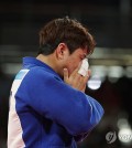 Lee Joon-hwan of South Korea reacts to his win over Matthias Casse of Belgium in the bronze medal match of the men's -81-kilogram judo event at the Paris Olympics at Champ-de-Mars Arena in Paris on July 30, 2024. (Yonhap)