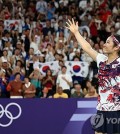 An Se-young of South Korea celebrates after winning the gold medal in the women's singles badminton event at the Paris Olympics at Porte de La Chapelle Arena in Paris in this file photo taken Aug. 5, 2024. (Yonhap)