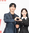 Actors Jung Hae-in and Jung So-min pose for photos during a press event for tvN's upcoming romantic comedy, "Love Next Door," in Seoul on Aug. 14, 2024, in this photo provided by the cable network. (PHOTO NOT FOR SALE) (Yonhap)