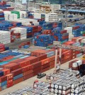 Shipping containers are stacked at a container yard in the port city of Busan on Aug. 1, 2024. (Yonhap)