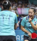 Shin Yu-bin (R) and Jeon Ji-hee of South Korea celebrate a point against Filippa Bergand and Christina Kallberg of Sweden during their doubles match in the quarterfinals of the women's table tennis team event at the Paris Olympics at South Paris Arena 4 in Paris on Aug. 6, 2024. (Yonhap)