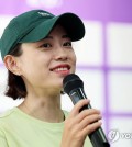 South Korean pistol shooter Kim Ye-ji speaks during a press conference at Jeollanamdo International Shooting Range in Naju, South Jeolla Province, on Aug. 20, 2024. (Yonhap)