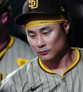 Aug 16, 2024; Denver, Colorado, USA; San Diego Padres shortstop Ha-Seong Kim (7) leaves the dugout in the seventh inning against the Colorado Rockies at Coors Field. Mandatory Credit: Ron Chenoy-USA TODAY Sports