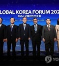 Participants in the Global Korea Forum, a global forum hosted by the unification ministry and designed to garner international support for South Korea's bid for peaceful unification, pose for a photo before the forum on Sept. 3, 2024. (Yonhap)