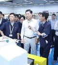 In this file photo provided by Samsung Electronics Co., Vice Chairman Han Jong-hee (C in white shirt) visits the company's facility in India on July 30, 2024. (PHOTO NOT FOR SALE) (Yonhap)