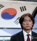 South Korea head coach Hong Myung-bo watches his team in action against Palestine during the teams' Group B match in the third round of the Asian World Cup qualification at Seoul World Cup Stadium in Seoul on Sept. 5, 2024. (Yonhap)