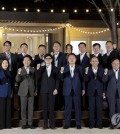 President Yoon Suk Yeol (front, 6th from R) poses with the leadership of the ruling People Power Party, including Chairman Han Dong-hoon (front, 6th from L), after their dinner meeting at a garden in front of the presidential office in Seoul on Sept. 24, 2024, in this photo provided by Yoon's office. (PHOTO NOT FOR SALE) (Yonhap)