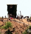 North Korean soldiers build a strongpoint in the Demilitarized Zone in this photo taken from a South Korean observation tower in Paju, 37 kilometers northwest of Seoul, on June 4, 2024. Earlier in the day, a motion calling for the full suspension of a 2018 inter-Korean tension reduction pact was passed at a Cabinet meeting following North Korea's sending of hundreds of trash-filled balloons into South Korea in the past few days. (Yonhap)