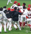 Kia Tigers players celebrate after winning the 2024 Korean Series title over the Samsung Lions following a 7-5 win in Game 5 at Gwangju-Kia Champions Field in Gwangju, 270 kilometers south of Seoul, on Oct. 28, 2024. (Yonhap)