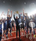 Ulsan HD FC players and coaches celebrate after clinching the 2024 K League 1 title with a 2-1 victory over Gangwon FC at Ulsan Stadium in Ulsan, 300 kilometers southeast of Seoul, on Nov. 1, 2024. (Yonhap)