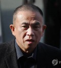 Myung Tae-kyun, a self-proclaimed political broker, arrives at the Changwon District Prosecutors Office in the southeastern province of South Gyeongsang on Nov. 8, 2024, for questioning about illegal political funds and other allegations. (Yonhap)