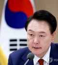 President Yoon Suk Yeol speaks during a meeting with ministers and senior aides at the presidential office in Seoul on Nov. 10, 2024, held to discuss the potential economic and economic impact of former U.S. President Donald Trump's return to the White House. (Yonhap)