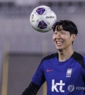 South Korea captain Son Heung-min controls the ball during a training session at Abdullah Al-Khalifa Stadium in Kuwait City on Nov. 12, 2024, in preparation for a World Cup qualifying match against Kuwait. (Yonhap)