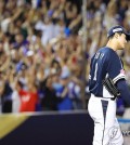 South Korean starter Ko Young-pyo reacts after giving up a grand slam to Chen Chen-Wei of Chinese Taipei during the teams' Group B game at the World Baseball Softball Confederation Premier12 at Taipei Dome in Taipei on Nov. 13, 2024. (Yonhap)