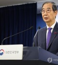 Acting President Han Duck-soo gives a public address at the government complex in Seoul on Dec. 26, 2024. (Yonhap)