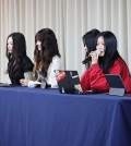 K-pop girl group NewJeans members hold a press conference in Gangnam, southern Seoul, on Nov. 28, 2024. (Pool photo) (Yonhap)