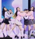 SM Entertainment's new girl group Hearts2Hearts performs the title track of its debut single, "The Chase," during a media showcase at a concert hall in eastern Seoul to mark the release on Feb. 24, 2025. (Yonhap)