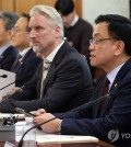 Acting President Choi Sang-mok (R) speaks during a meeting of a government committee on foreigner policies in Seoul on March 5, 2025. (Yonhap)