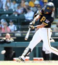 Mar 11, 2025; Bradenton, Florida, USA; Pittsburgh Pirates outfielder Ji Hwan Bae (3) singles during the third inning against the New York Yankees at LECOM Park. Mandatory Credit: Kim Klement Neitzel-Imagn Images
