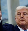 U.S. President Donald Trump gestures during a swearing-in ceremony for Alina Habba as interim U.S. Attorney for the District of New Jersey, in the Oval Office at the White House in Washington, D.C., U.S., March 28, 2025. REUTERS/Evelyn Hockstein