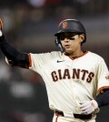 Apr 7, 2025; San Francisco, California, USA; San Francisco Giants center fielder Jung Hoo Lee (51) gestures after hitting a single against the Cincinnati Reds during the ninth inning at Oracle Park. Mandatory Credit: John Hefti-Imagn Images