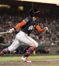 Apr 8, 2025; San Francisco, California, USA; San Francisco Giants center fielder Jung Hoo Lee (51) hits a single against the Cincinnati Reds during the sixth inning at Oracle Park. Mandatory Credit: John Hefti-Imagn Images