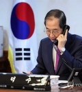 Acting President and Prime Minister Han Duck-soo holds phone talks with U.S. President Donald Trump at his office in Seoul on April 8, 2025, in this photo provided by the Prime Minister's Office. (PHOTO NOT FOR SALE) (Yonhap)